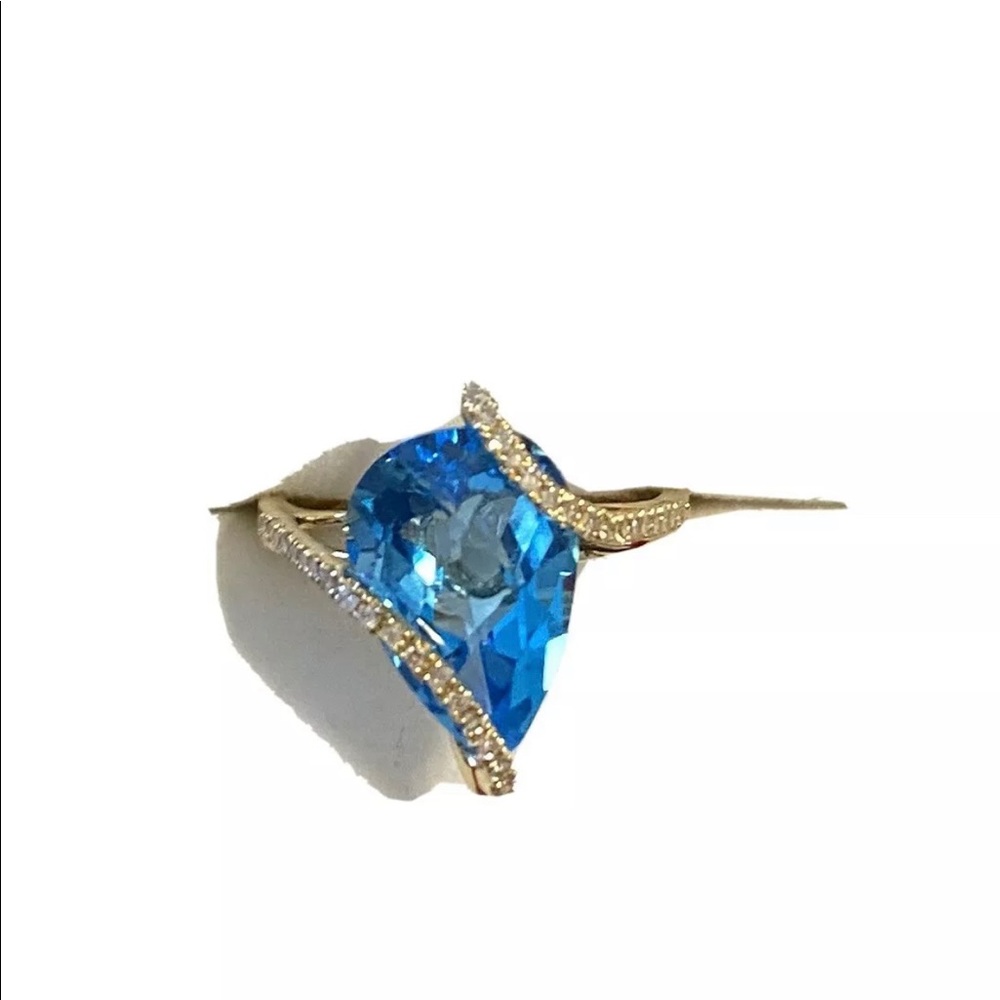 Eddy Blue Topaz and Diamond Ring